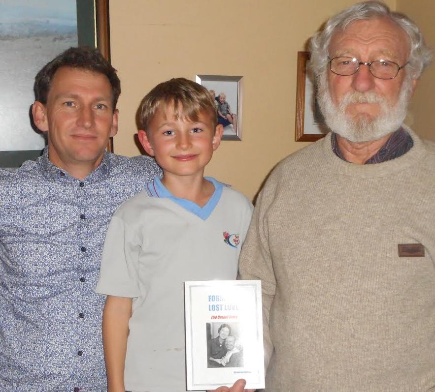 Benjamin Howson, Elijah Howson and Martin Howson, with the book 'Formby's Lost Love' in New Zealand.