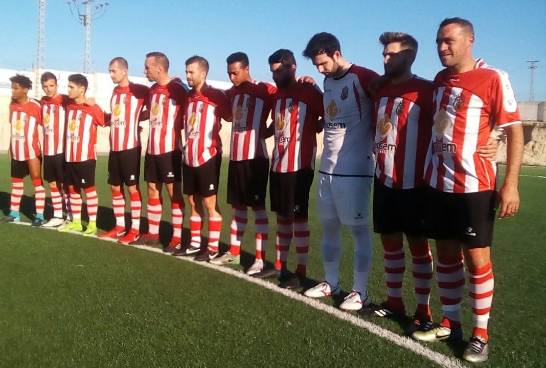 CD Montesinos and Hondon Nieves stand in a one minutes silence before kick off. Photos: Andrew Atkinson.