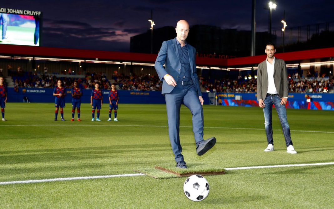 Jordi Cruyff kicks off the first ever game held at the new facility named after his father