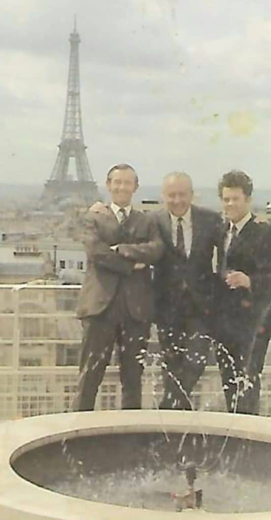 Tony Slater (right) awaits Bridget Bardot at the Eiffel Tower.