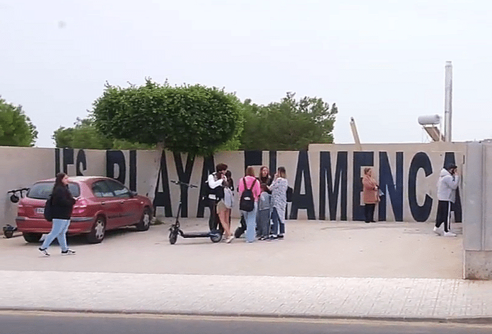 Students begin to gather at the school on Monday morning